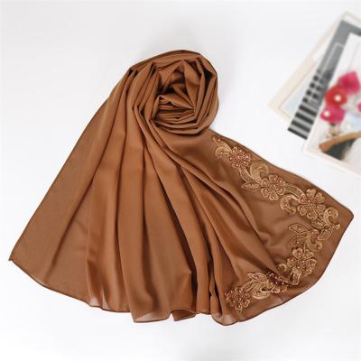 China Hot Selling Women's Floral Scarf Cover Headwear Popular Monochrome Islamic Chiffon Scarf Long Fashionable Scarf for sale