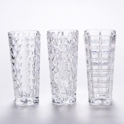 China Eco-friendy hurricane cubic factory stock wholesale cylinder clear glass vase with heart shape mouth for sale