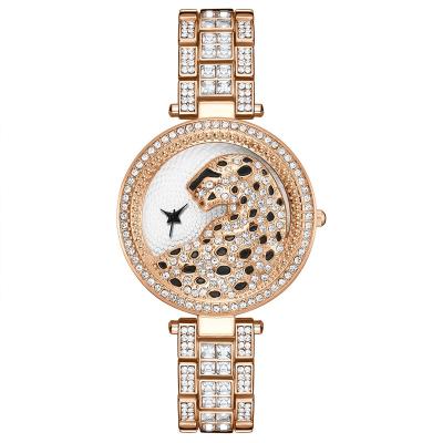 China Luxury Crystal Women Dress Watch Fashion Rose Gold Leopard Design Trending Water Resistant Watches For Women for sale