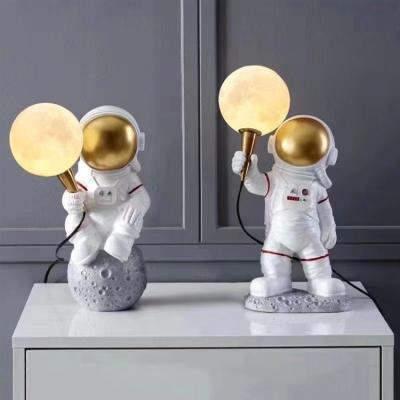 China Modern post modern simple warm soft astronaut table lamps bedroom lighting fixtures nightstand lamps for sale