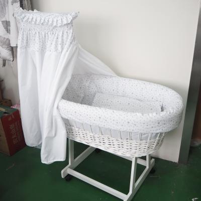 China Solid Wood White Wicker Basket Drape Cradle With Caster for sale