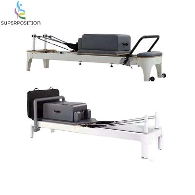 China metal commercial fitness equipment 200kg pilates machine white aluminum reformer bed for sale for sale