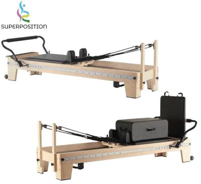 China custom logo 300kg logo 300kg gym fitness yoga wooden machine maple wooden pilates reformers for sale