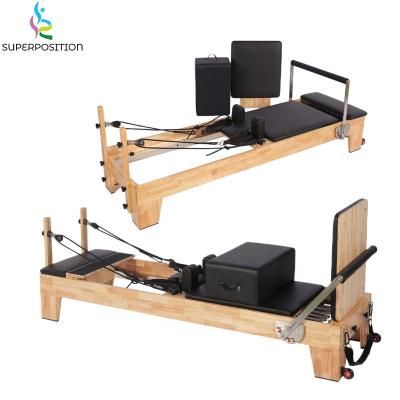 China Professional Fitness Center Gym Exercise Core Muscle Shaping Beech Wood Pilates Wooden Reformer for sale