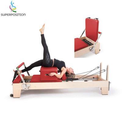 China New hot sale 300KG training custom logo fitness machine maple wooden pilates reformers for sale