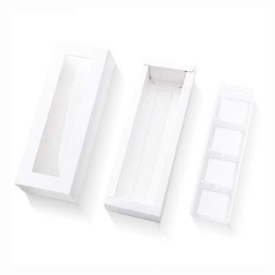 China 10 PCS Recyclable White Pull Out Truffle Boxes Chocolate Candy Packaging Boxes With Clear Window Sleeves for sale