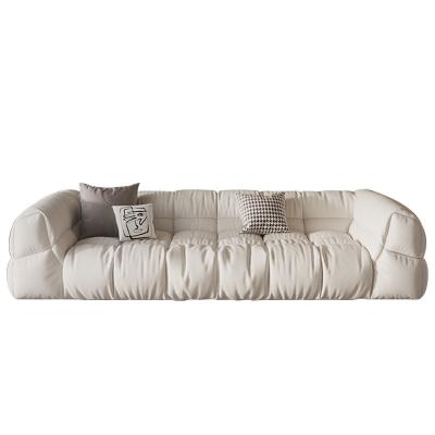 China Simple Atmospheric Cut Italian Minimalist Cream Sofa Cloud Living Room Sofa White Villa Apartment Sofa Bed for sale