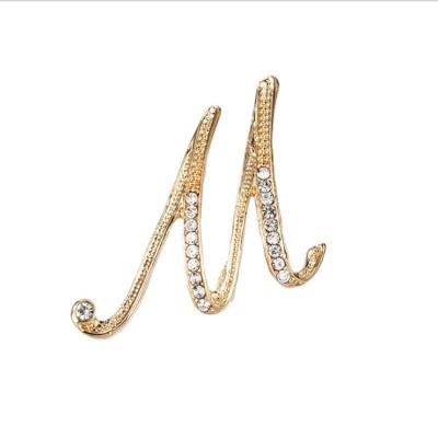 China New 26 Fashionable Fashion English Letter Brooch Alloy Rhinestone Brooch Women Brooch High End Electroplating Clothing Accessories for sale