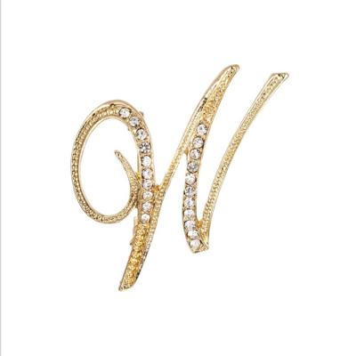 China New 26 Fashionable Fashion English Letter Brooch Alloy Rhinestone Brooch Women Brooch High End Electroplating Clothing Accessories for sale