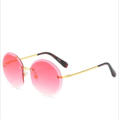 China Fashion sunglasses 2021 new men and women shape UV outdoor riding round sun glasses metal sunglass balancing frameless sunglasses for sale