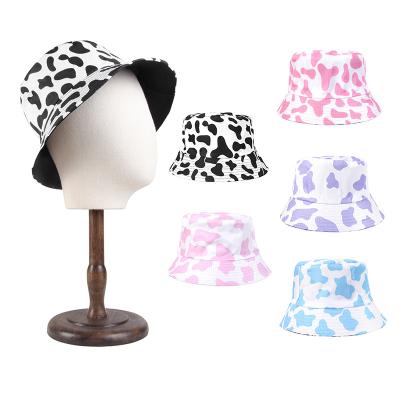 China Character FayeIn 2022 Reversible Bucket Hats For Women Travel Beach Sun Hat Cow Print Unisex Outdoor Hat for sale