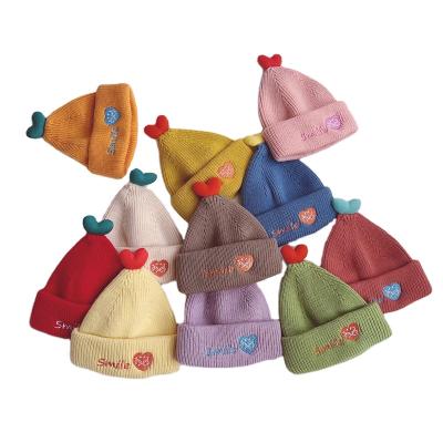 China Candy COMMON color style INS sharp children knitted hat autumn and winter love infant baby warm magician's woolen hat for sale