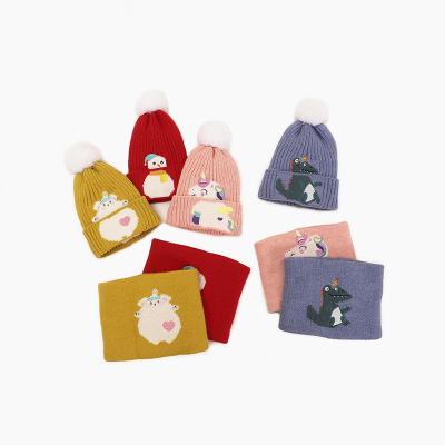 China Medium Children's Hat Set 2021 Autumn And Winter Dinosaur Unicorn Baby Knitted Hat Cartoon Warm Scarf Wool Hat for sale