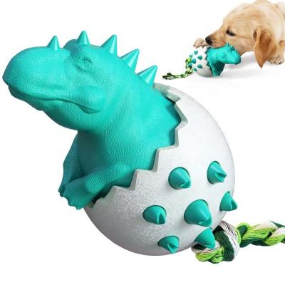 China Viable Dog Toothbrush Chew Toys Teeth Cleaning Dinosaur Egg Shaped Teeth Bite Resistance Water Toy for sale