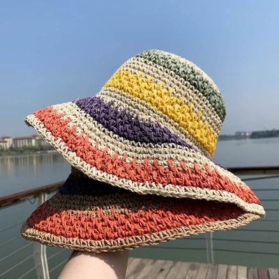 China Breathable.Sunshade Stylish Goddess Hollowed Out Beach Hat Colorful Stripes Sunscreen Straw Hat Travel And Holiday Sun Visor Handwoven Hats for sale