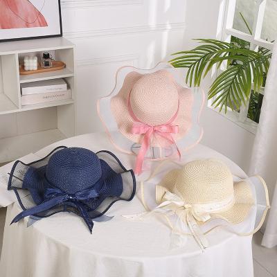 China Summer fresh netting gossip Straw Hat Elegant Women widen brim beach hat bow decoration girls boutique sun visor for sale