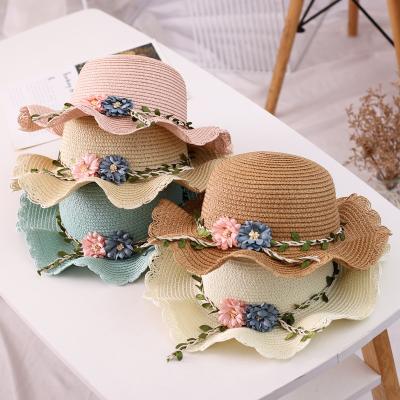 China Cute new style summer little girls Straw Hat Wavy Lace Small fresh flower sun visor hat seaside cool beach hat for sale