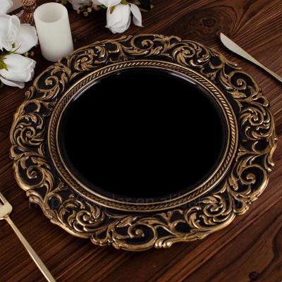 China Sustainable Kitchen Design Simple Black / Gold Raw Loader Plastic Dishes With Engraved Baroque Rim , Round Serving Trays for sale