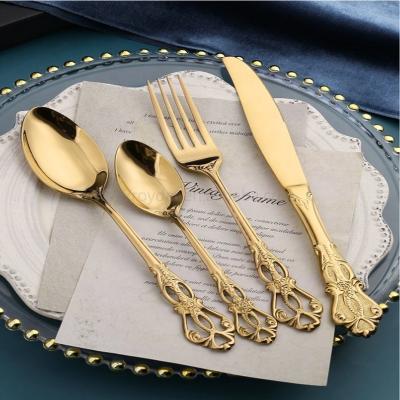 China Stocked 4pcs Stainless Steel Flatware Set Royal Golden Hollow Out Cutlery Set For Party for sale