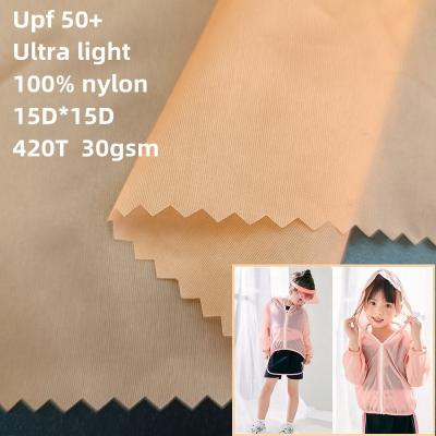 China Upf 50 Breathable Ultra Light Nylon Taffeta Fabric 15D*15D 420T 100% Nylon Sheer Fabric For Sun Protection Clothing for sale