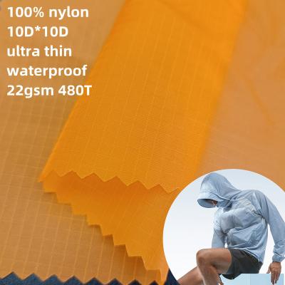 China Waterproof Fabric 100% Ultra Thin Super Lightweight Nylon Sheer Ripstop Nylon Fabric 10D*10D Waterproof Fabric For Sunscreen Clothing for sale