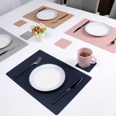 China Durable Solid Leather For Restaurants Waterproof Square Custom Printed Different Types Christmas PU Table Mat Washable Leather Place Mats for sale