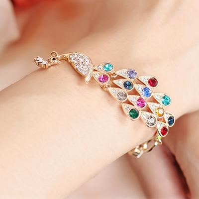 China Colorful Designs Shape 18K Gold Plated Colorful Austrian Rhinestone Peacock Bangle Multicolor Crystal Bangle Bracelet For Women Charm Jewelry for sale