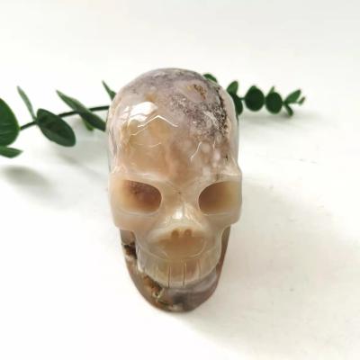 China China Natural Gemstone Cherry Blossom Agate Skulls Flower Agate Quartz Crystal Skulls for sale