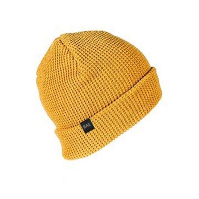 China COMMON Winter Warm Yellow Beanie Tags Waffle Beanie Hats Knitted Beanie for sale