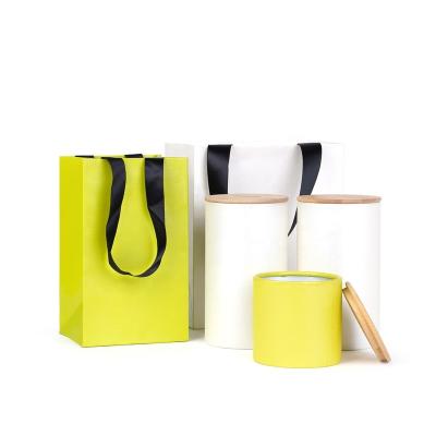 China Custom Biodegradable Luxury Bontique Logo Foldable Carrier Paper Gift Shopping Bag with Ribbon Handle for sale