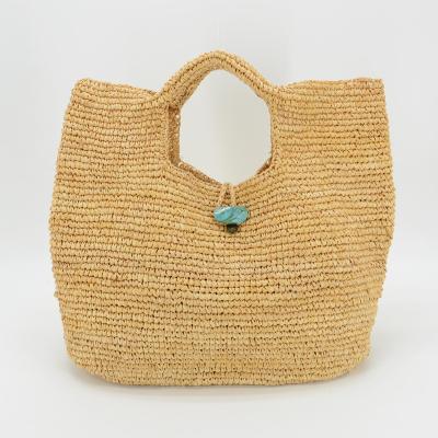 China Fashion latest hot fashion natural raffia straw tote bag handmade crochet straw bag with stone closure for sale