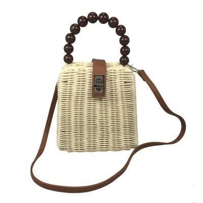 China Wholesale Shoulder Bag Summer Designs Straw Shoulder Rattan Hollow Bag Around Rattan Wicker Bag for sale