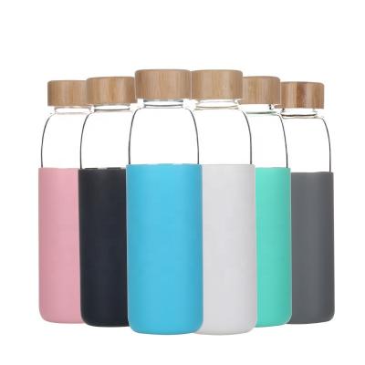 China Customized Viable Logo 550ML High Borosilicate Glass BPA Free Water Bottle With Bamboo Lid And Silicone Sleeve for sale