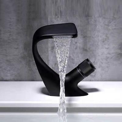 China Luxury Black Brass Basin Faucet Bathroom Stainless Steel Single Metered Waterfall Hot And Cold Water Mixer Taps for sale