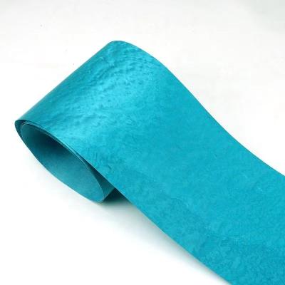 China Sapeli Tropical Blue Pomelle Dyed Fleece Backed Wood Veneer For Wood Working Crafts Furniture Sheets for sale