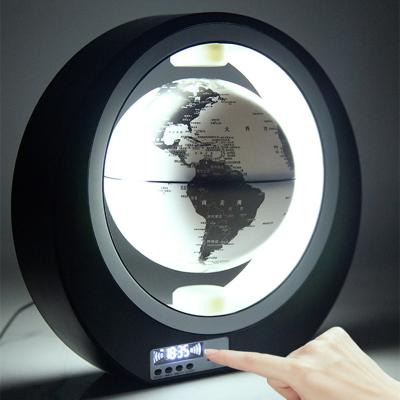 China Toy Dipper Speaker Magnetic Levitation Globe Black Color Finger Reading Clock Educational Wireless Light for sale