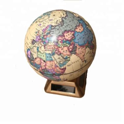 China Rotary Globe Self Rotating Solar Powered Automatic Rotating World Globe Model for sale