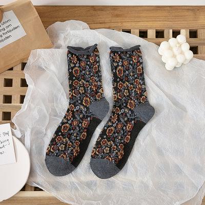 China Breathable quake socks shape new vintage autumn and winter women's relief candy in cylinder design wholesale quake socks for sale