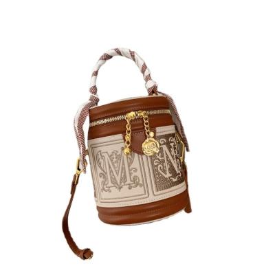 China Others 2023 new popular handheld fashion light luxury embroidery cylinder senior sense bucket crossbody bag for sale