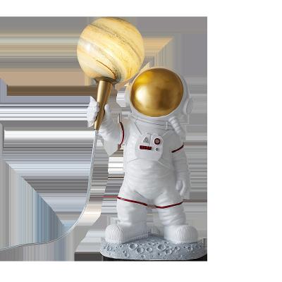 China Factory direct supply modern bedroom resin wall lamp astronaut simple wall lamp for sale