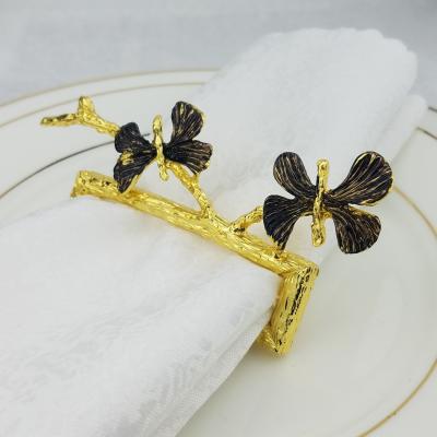 China New viable unique gold metal napkin ring, trunk design napkin holder ring for sale