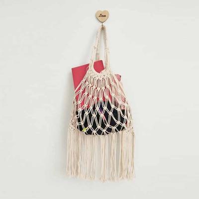 China Casual Travel Summer Beach Decorate Handbag Fringed Cotton Rope Hand - Hollow Woven Net Handbag for sale