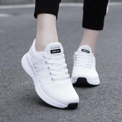 China Cushioning Lightweight Breathable Rubber Sneakers White Tennis Sports Running Casual Shoes Woman for sale