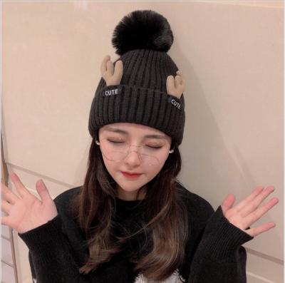 China Winter COMMON FIXED Newest Fashion Cute Deer Horn Knitted Beanie Hat With Pompom Fur Ball for sale