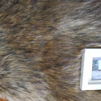 China Custom High Density Auto Brown Faux Wolf 100 Polyester Upholstery Faux Fur Fabric For Craft Coats for sale