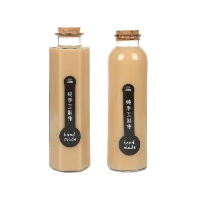 China 300ML 350ML 500MLbeverage Transparent Beverage Packing Bottles Glass Cork Cap Seal Milk Juice Bottle for sale