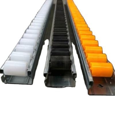 China Garment Shops Slide Rail Width 60 Wheel High 33 Wheel Conveyor Track Warehouse Roller Industrial Roller Conveyor Track for sale