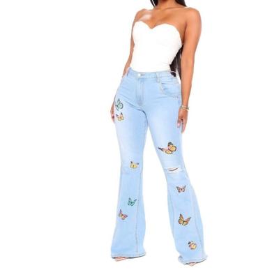 China Women Breathable Light Blue All-match Jeans Factory Price Slim Butterfly Embroidery Ripped To Stretch Flare Jeans for sale