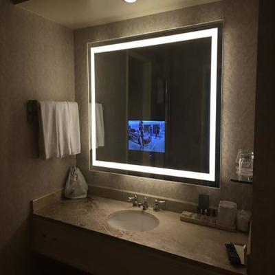 China Hotel Bathroom Electric Lighted Illuminated Mirror TV Waterproof Smart Mirror for sale