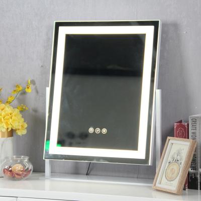 China Table Vanity Position Touch Lighted Sensor Dimming LED Lighted Metal Makeup Mirror With Light for sale